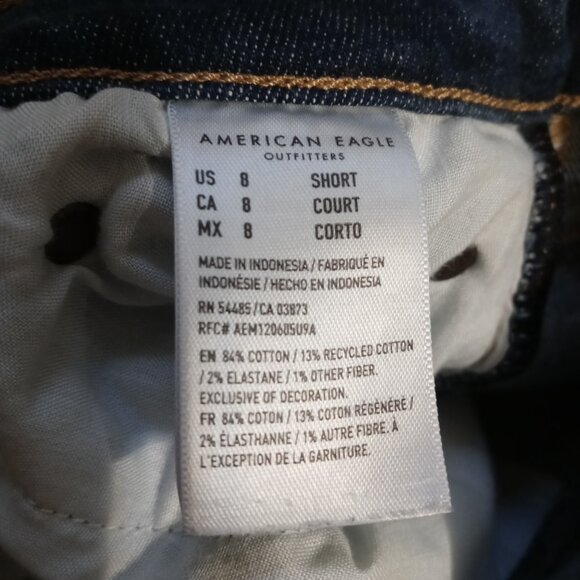 AMERICAN EAGLE stretch super hi-rise flare jeans in Dark Rinse (8 short) - Picture 11 of 13